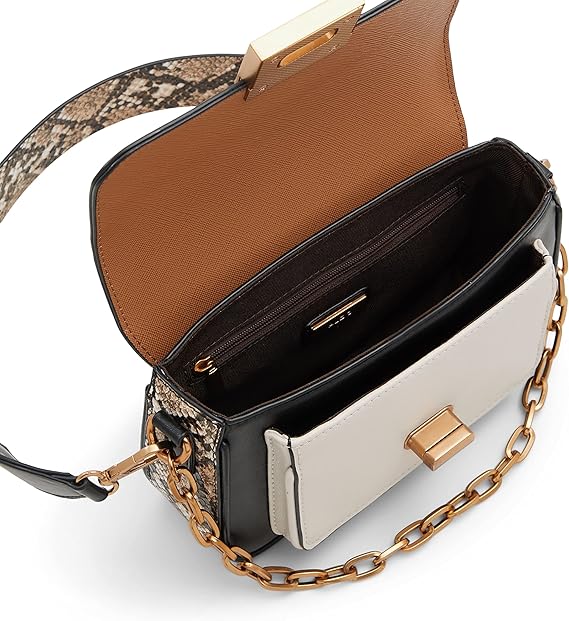 Ladies' handbags, crafted from carefully selected high-quality fabrics, embody luxury and elegance, revealing a sense of refinement amidst simplicity.